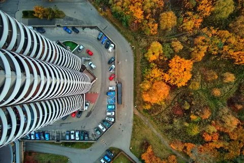 High angle top-down aerial shot of a Kukurydze residential tower situated bet Stock Photos