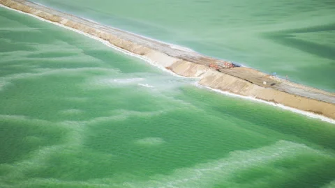 High-Angle Top-Down Close-Up Aerial View of Mangya Emerald Lake and Salt Road Stock Footage 343799524