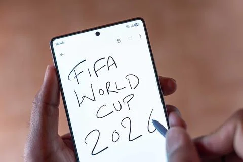 High Angle Top View of Hand Using Stylus to Write FIFA World Cup 2026. Stock Photos