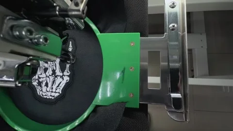 High Angle Top View Industrial Embroidery Machine Stitching White Skeleton .. 스톡 동영상 332205710
