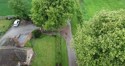 High Angle tracking drone shot of a man on a motorbike. 库存影片 242584352