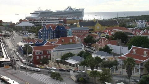 High-angle tracking shot of Willemstad, Curacao, with cruise ship in bkgrd. Stock-Footage 90500074