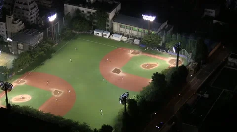 High angle of two baseball games being played simultaneously on the same field Video stock 47329574
