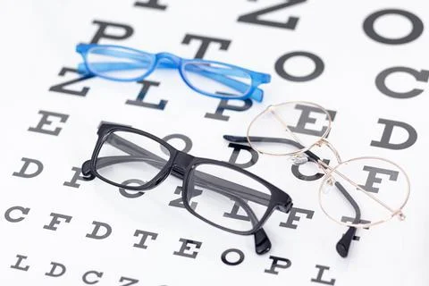 High angle of two pairs of glasses with letters. High quality photo Stock Photos