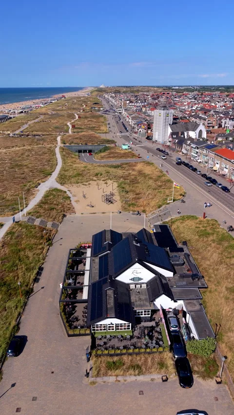High angle vertical aerial drone video clip of Ristorante Rosa coastal dunes Stock Footage 342633064