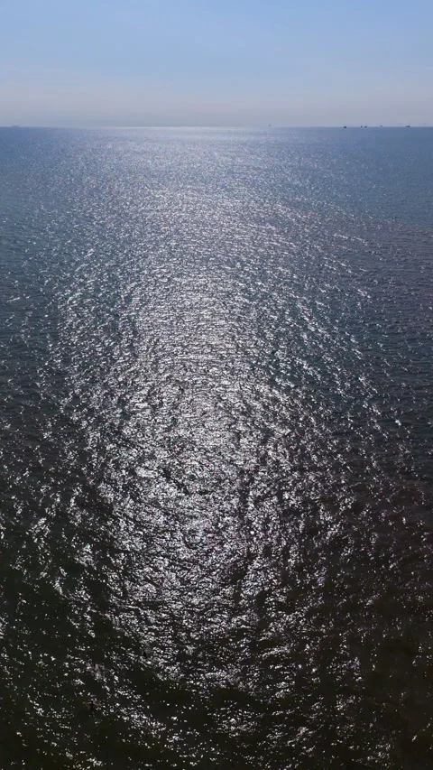 High angle vertical aerial drone video clip of sparkling North Sea water Stock Footage 342637071