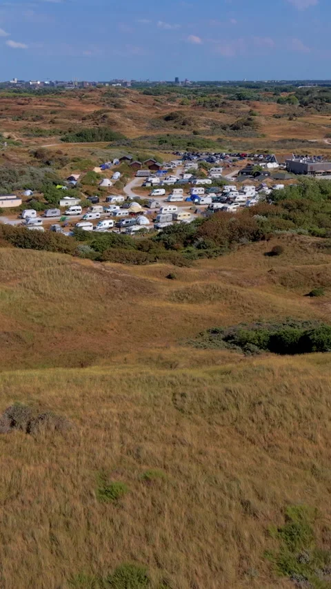 High angle vertical aerial drone video clip of coastal sand dunes, dune Vídeos de archivo 343143064