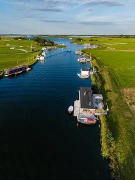 High angle vertical aerial drone photograph of canal, houseboats, De Faljer Stock Photos