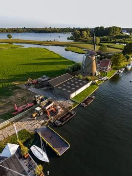 High angle vertical aerial drone photograph of De Faljeril windmill, yard Stock Photos