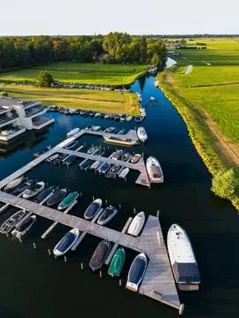High angle vertical aerial drone photograph of marina, floating wooden pier Stock Photos