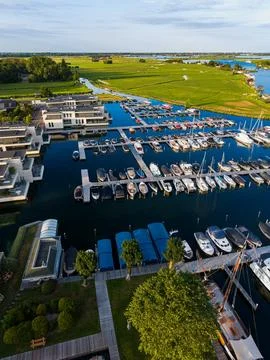 High angle vertical aerial drone photograph of full marina basin, wooden Stock Photos