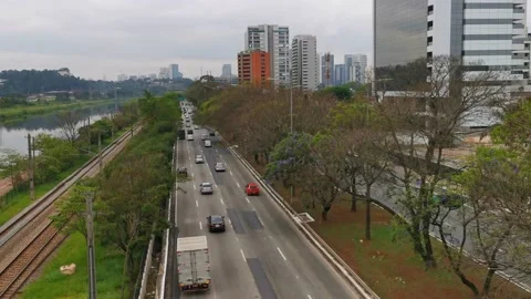 High angle view of 3 ways to commute, bike lanes, highway and railroad Stock Footage 139780844