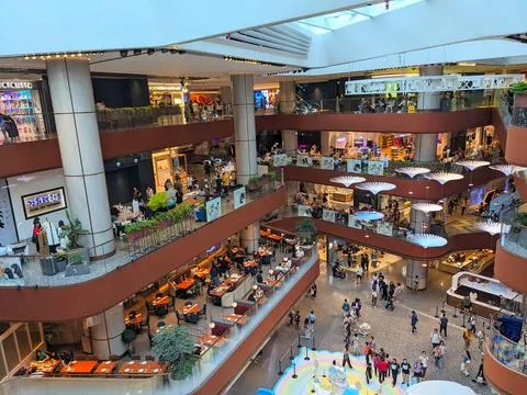 High angle view of AIRSIDE Kai Tak, a bustling multi-level shopping mall with Stock Photos