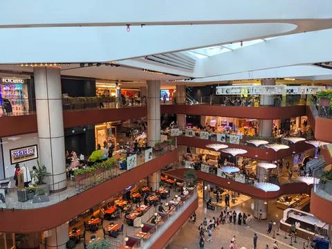 High angle view of AIRSIDE Kai Tak, a bustling multi-level shopping center with Stock Photos