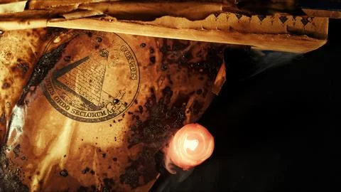High Angle View Of All Seeing Eye Symbol With Melting Red Candle On Parchment Stock Photos