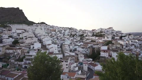 High angle view of Alora city. Beautiful orange sunset. White village Stock Footage 304741702