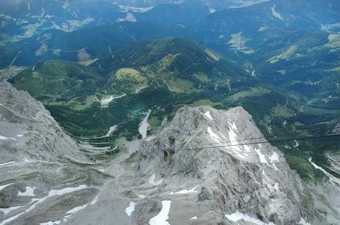 High angle view of alpine valleys and cable wires from Dachstein 스톡 사진