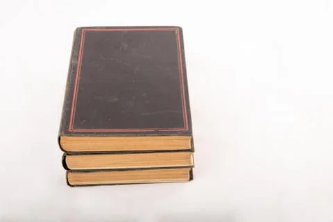 High angle  view of ancient books on white surface Stock Photos