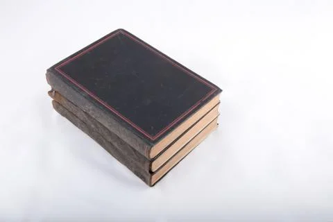 High angle  view of ancient books on white surface Stock Photos