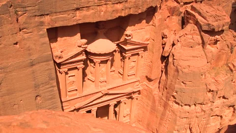 High angle view of the ancient rock-cut Treasury building Al Khazneh carved into Stock Footage 309759682