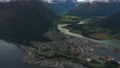 High angle view of Andalsnes nestled by sea and mountains Stock Footage 320951663