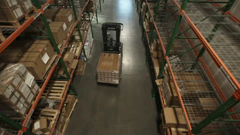 High angle view of approaching forklift driver in warehouse / American Fork, Stock-Footage 275541819
