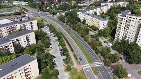 High angle view of asphalt highway and parking lot in European city Stock-Footage 347528142