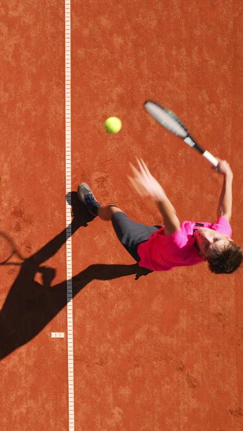 High-angle View of Athlete in Dynamic Play on Clay Court 库存影片 317959302
