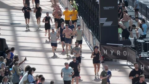 High Angle View of Athletes Running in Hyrox Fitness Competition Stock Footage 342290122