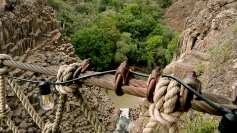 High Angle View of Basalt Canyon and Small Bridge Surrounded by Trees in Mexico Stock Footage 336336883