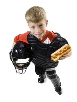 High angle view of a baseball catcher holding a baseball helmet Stock Photos