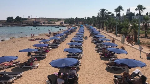 High Angle View Of Beach With Blue Umbrellas Stock Footage 116611179
