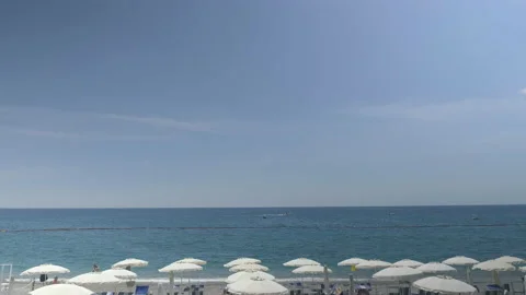 High angle view of beach parasols facing the sea Stock Footage 169474822