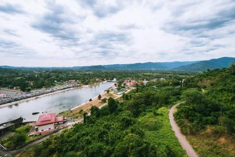 High angle view behind Khun Dan Prakan Chon Dam, with nature, mountains and b Stock Photos