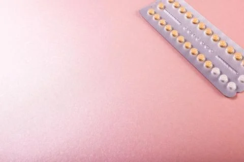 High angle view of blister pack of medicines isolated over pink background, copy Stock Photos
