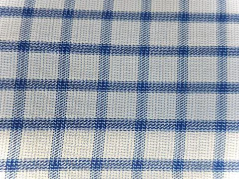 High angle view of blue and white gingham fabric texture, classic checkered  Stock Photos