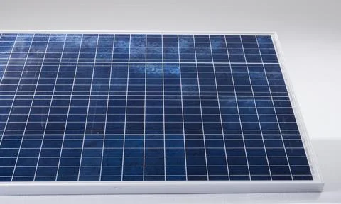 High angle view of blue solar panel with grid patterns isolated against white Stock Photos