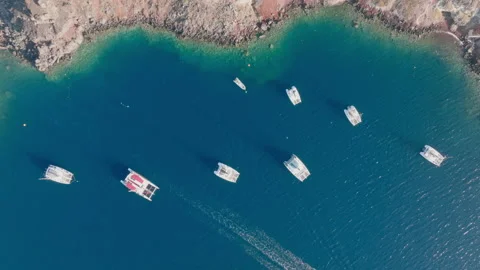 High angle view of boats anchored by Santorini island, Greece Stock Footage 220212381