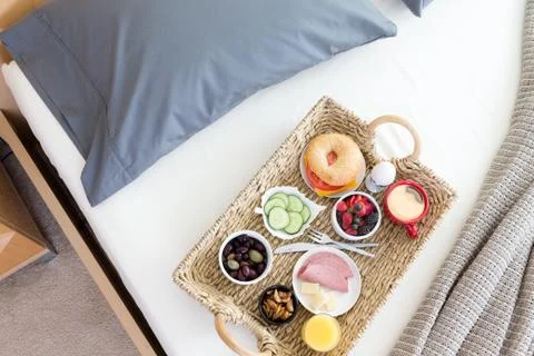 High Angle View of Breakfast Tray on Unmade Bed Stock Photos