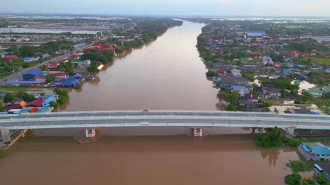 High angle view of a bridge over a river with 4 traffic lanes. Stock Footage 218609610