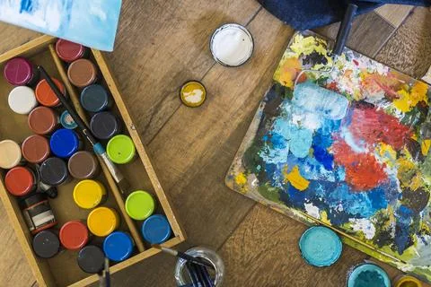 High angle view of brushes pallete oils acrylics and other elements of a 스톡 사진