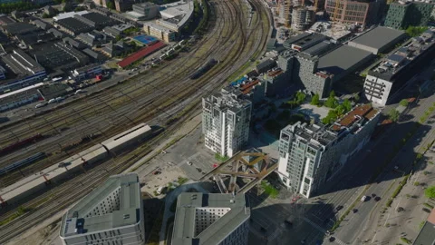 High angle view of buildings in modern urban borough between railway tracks and Vídeos de archivo 209163671