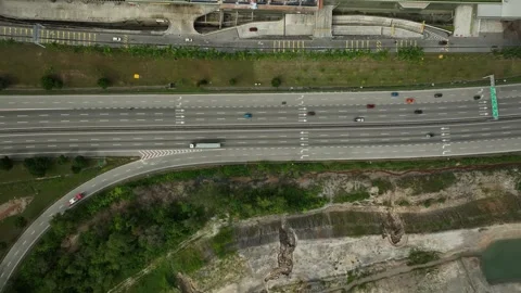 High angle view of busy highway with multiple lanes and vehicles in motion Stock Footage 311987129