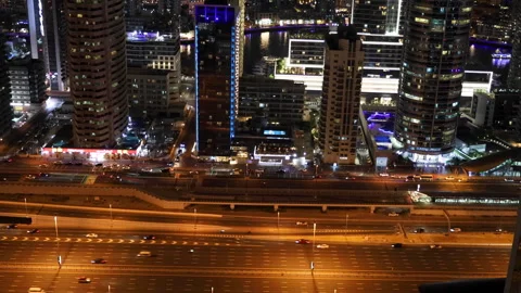 High angle view of busy Sheikh Zayed road with Dubai Marina skyscrapers Stock Footage 303695639
