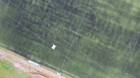 High angle view of cable car moving above football field Stock Footage 236989076