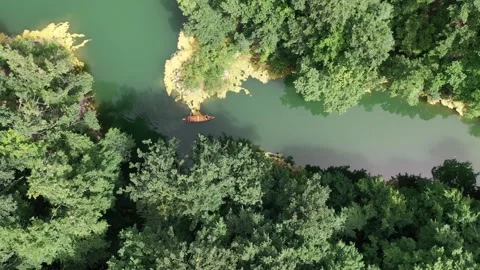 High angle view of canoe in a lake surrounded by the forest Stock Footage 277333412
