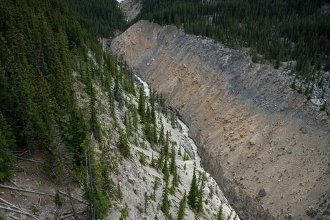 High angle view of a canyon river cutting through a mountain landscape. Stock Photos