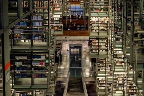High angle view of the central elevator shaft and suspended book stacks inside t Stock Photos