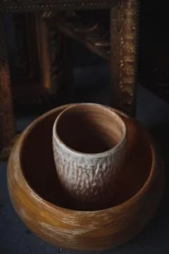High angle view ceramic cup and bowl in picture frames like on painting Stock Photos