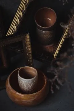 High angle view ceramic cup and bowl in picture frames like on painting Stock Photos